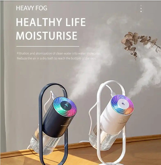 MistGlow device emitting mist on bedside table